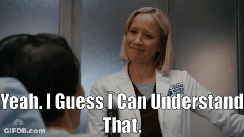 A Woman In A White Coat With The Words Yeah I Guess I Can Understand That GIF