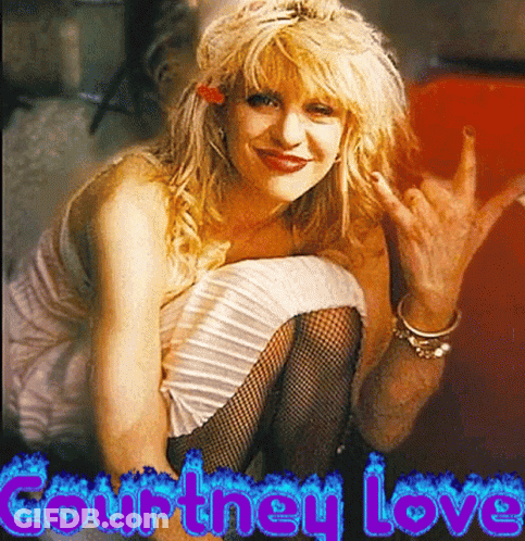 A Woman In A White Dress And Fishnet Stockings Is Sitting With The Words Courtney Love Behind Her GIF