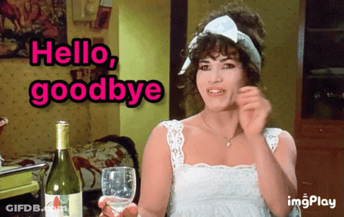 A Woman In A White Dress Holds A Glass Of Wine And Says Hello Goodbye GIF