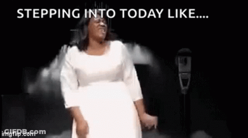A Woman In A White Dress Is Dancing On A Stage In Front Of A Microphone With The Words Stepping Into Today Like . GIF
