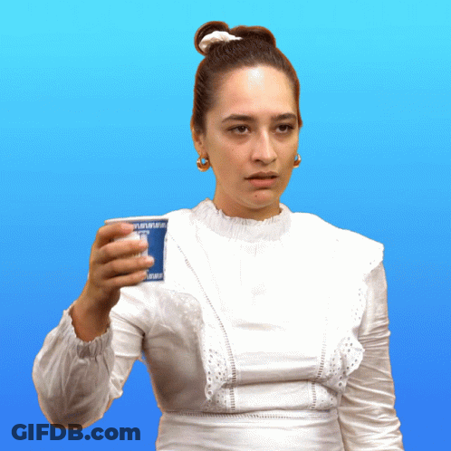 A Woman In A White Dress Is Holding A Cup That Says " Yogurt " GIF