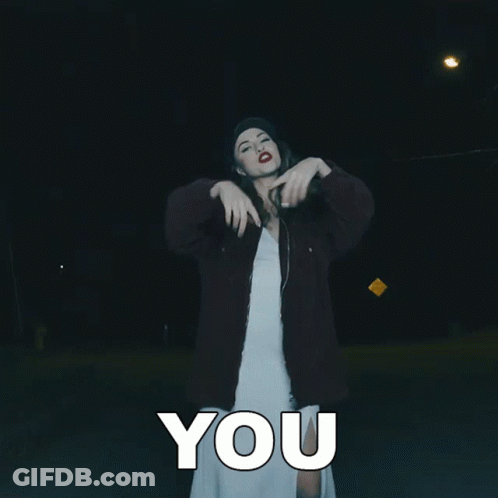Woman In White Dress Pointing At Camera With You GIF