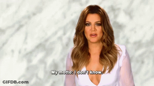 A Woman In A White Dress Is Saying `` My Motto : I Don 'T Know . '' GIF