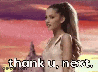A Woman In A White Dress Is Saying Thank U Next GIF