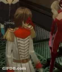 A Woman In A White Dress Is Standing Next To A Man In A Black Jacket . GIF