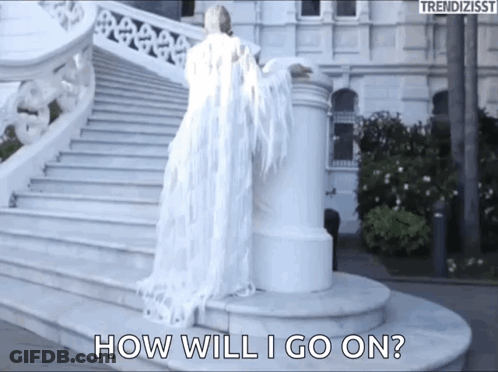 A Woman In A White Dress Is Standing On A Set Of Stairs And Says How Will I Go On . GIF