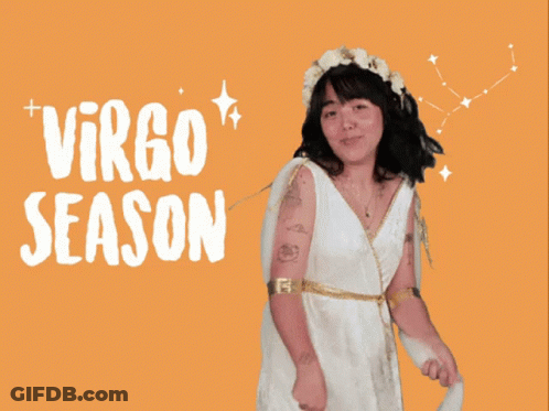 A Woman In A White Dress Stands In Front Of An Orange Background With Virgo Season Written On It GIF
