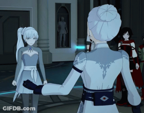 A Woman In A White Dress Stands Next To Another Woman In A Grey Dress GIF