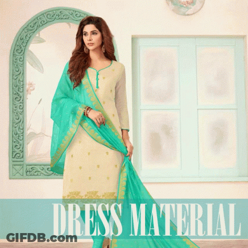 A Woman In A White Dress With A Blue Dupatta Stands In Front Of A Window With The Words Dress Material Below Her GIF