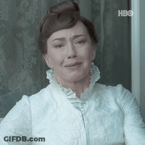 A Woman In A White Dress With A Hbo Logo On The Bottom Left GIF
