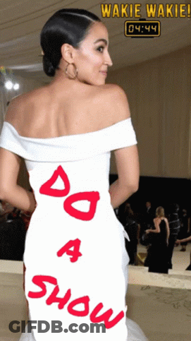 A Woman In A White Dress With The Words Do A Show Written On The Back GIF