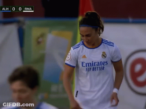 A Woman In A White Emirates Fly Better Jersey GIF