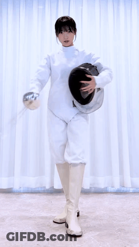 A Woman In A White Fencing Outfit Is Holding A Helmet And A Sword . GIF