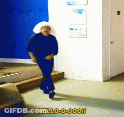 A Woman In A White Hat Says Hello-O-Oooh In A Room GIF