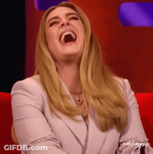 A Woman In A White Jacket Is Laughing With The Word Adel Written On The Bottom Right GIF