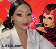 A Woman In A White Jacket Is Standing In Front Of A Cartoon Character GIF