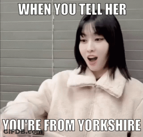 A Woman In A White Jacket With A Meme That Says When You Tell Her You 'Re From Yorkshire GIF