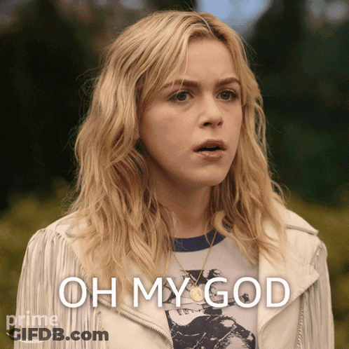 A Woman In A White Jacket With The Words Oh My God Behind Her GIF