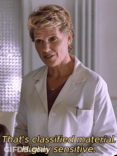 A Woman In A White Lab Coat Says That 'S Classified Material GIF