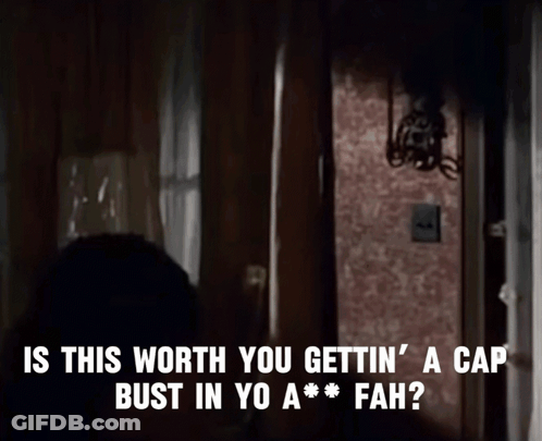 A Woman In A White Robe Is Talking To A Man In A Dark Room GIF