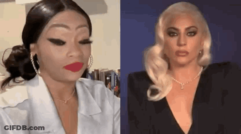A Woman In A White Shirt And A Lady Gaga In A Black Dress Are Making Funny Faces . GIF