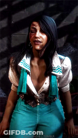 A Woman In A White Shirt And Blue Pants Is Sitting On A Bench GIF
