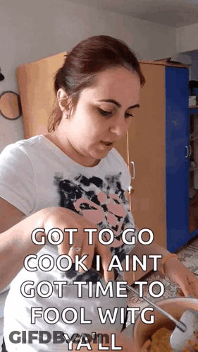 A Woman In A White Shirt Is Cooking And Says Got To Go Cook I Aint GIF
