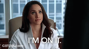 A Woman In A White Shirt Is Sitting In A Chair And Saying `` I 'M On It . '' GIF