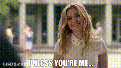 A Woman In A White Shirt Is Smiling And Saying `` Unless You 'Re Me ... '' GIF