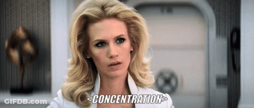 A Woman In A White Shirt With The Word Concentration Written Below Her GIF