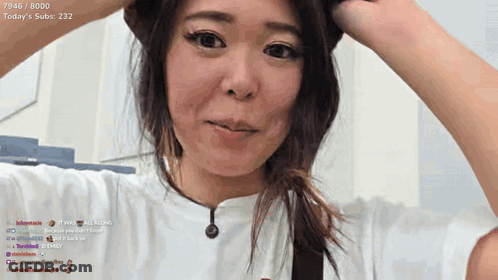 A Woman In A White Shirt With Today 'S Subs 232 On The Bottom Right GIF