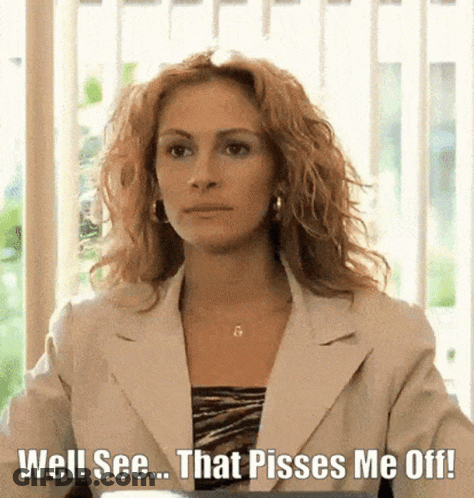 A Woman In A White Suit Is Sitting In Front Of A Window With The Words `` Well See ... That Pisses Me Off ! '' GIF