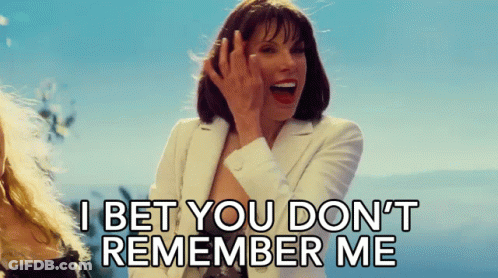 A Woman In A White Suit Says I Bet You Don 'T Remember Me GIF