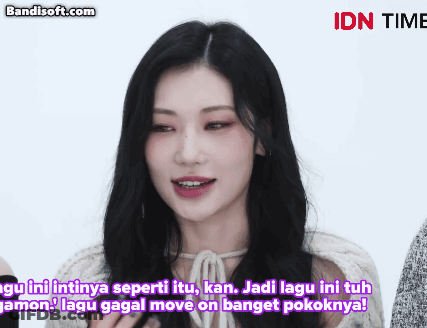 A Woman In A White Sweater Says " Lagu Ini Intinya Seperti Itu , Kan . " GIF