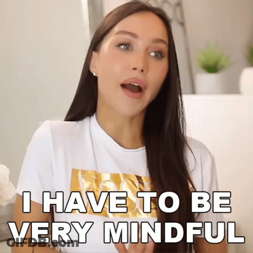 A Woman In A White T-Shirt Is Saying I Have To Be Very Mindful GIF