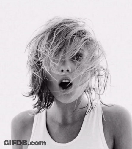 Woman In White Tank Top With Mouth Open GIF