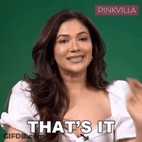 A Woman In A White Top Says That 'S It In Front Of A Green Background GIF