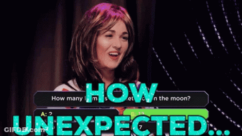 A Woman In A Wig Is Answering A Question About How Many Moons There Are GIF