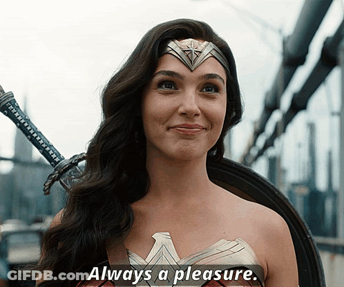 A Woman In A Wonder Woman Costume Is Smiling With The Words Always A Pleasure Underneath Her GIF