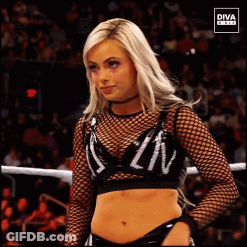 A Woman In A Wrestling Ring With A Diva Logo On The Bottom Right GIF