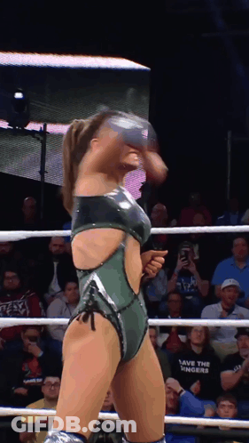 A Woman In A Wrestling Ring With A Shirt That Says Save The Numbers GIF