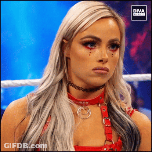 A Woman In A Wrestling Ring With The Diva Girls Logo GIF