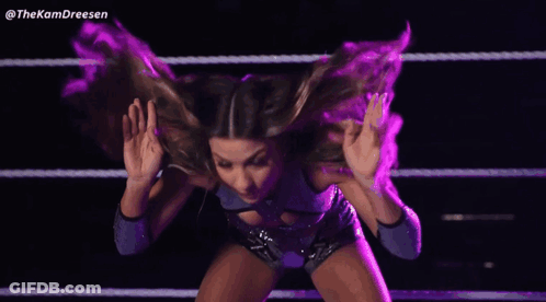 A Woman In A Wrestling Ring With The Hashtag Thekamdreesen On The Bottom GIF