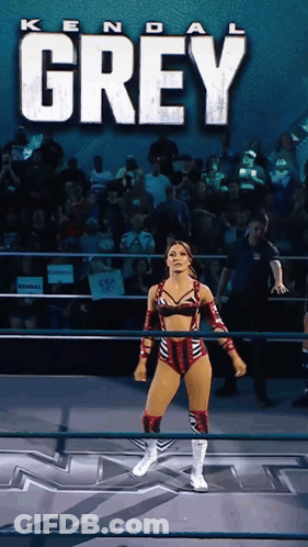 A Woman In A Wrestling Ring With The Name Kendal Grey GIF