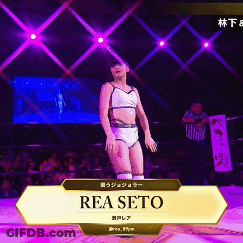 A Woman In A Wrestling Ring With The Name Rea Seto On The Screen GIF