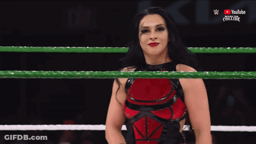 A Woman In A Wrestling Ring With Youtube Written On The Bottom GIF