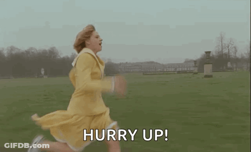 A Woman In A Yellow Dress Is Running In A Field With The Words Hurry Up . GIF
