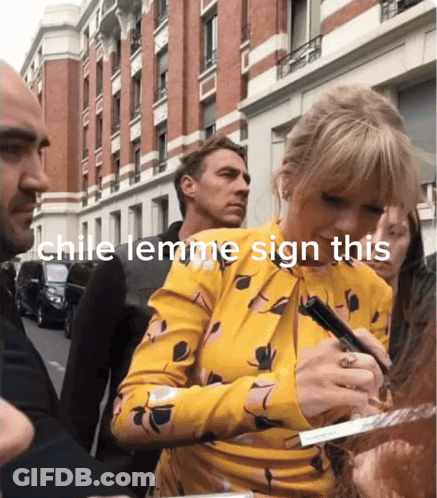 A Woman In A Yellow Dress Is Signing A Piece Of Paper With The Words Chile Lemme Sign This Above Her GIF