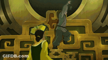 A Woman In A Yellow Dress Is Standing Next To A Man On A Throne GIF