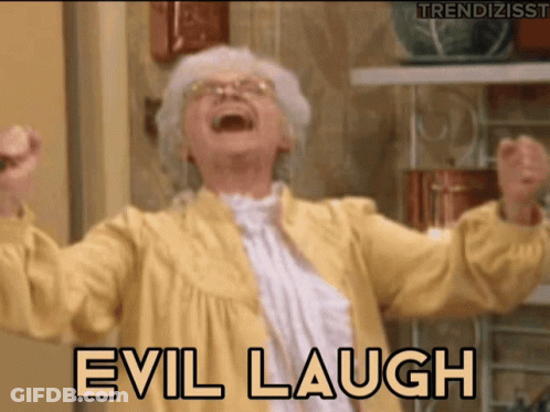 A Woman In A Yellow Robe Is Laughing With The Words Evil Laugh Behind Her GIF